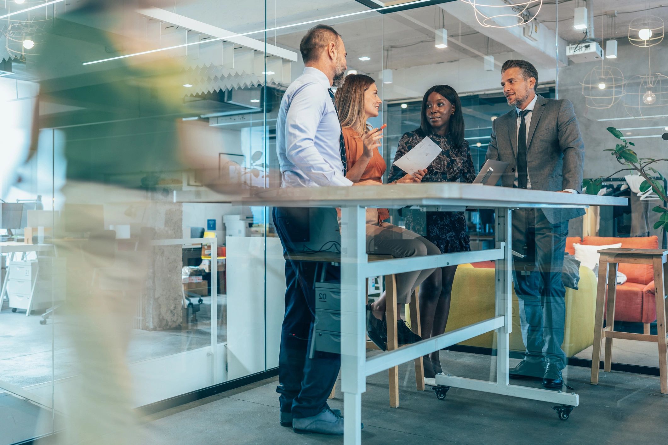 Businesspeople in conference room discussing ideas