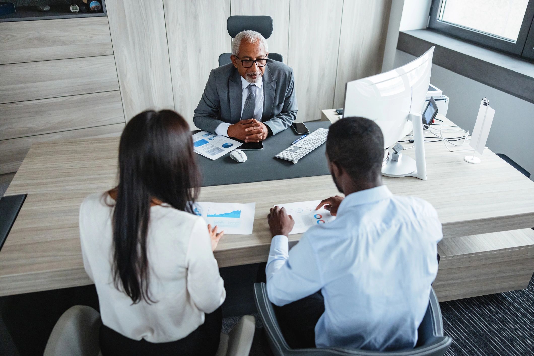 Business professionals in a corporate finance meeting